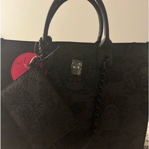 VIRAL Hard to find Betsey Johnson embossed skull bag.